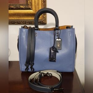 **SOLD**Coach Rogue
